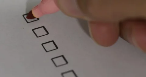 Person Ticks Checkbox Marks with a Pen, filling up To Do List. Stock Footage 127797328