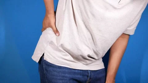 Person touching and messaging back with painful ache injury backache medical Video stock 336585273