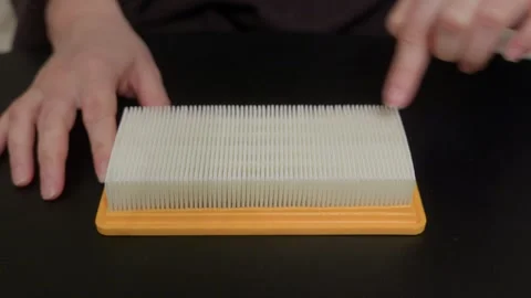 Person touching HEPA filter texture, close up inspection 스톡 동영상 344516920