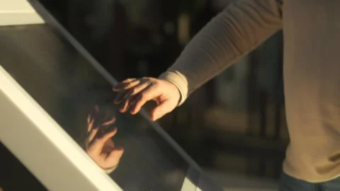 Person is touching a screen with their hand Stock Footage 303162461