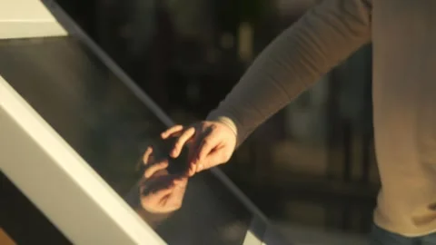 Person is touching a screen with their hand Stock Footage 304563880