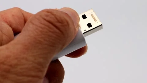 Person touching a USB memory stick Stock Footage 335262563