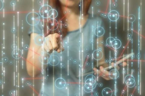 Person touching a virtual icon on a computer binary code Stock Photos