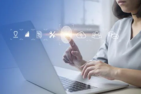 Person touching virtual screen to scan fingerprints, digital transformation m Stock Photos