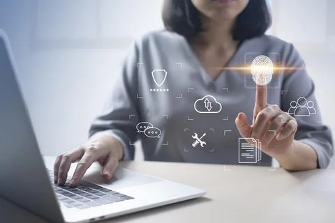 Person touching virtual screen to scan fingerprints, digital transformation m Stock Photos