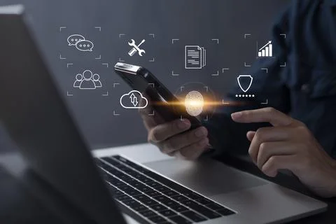 Person touching virtual screen to scan fingerprints, digital transformation m Stock Photos
