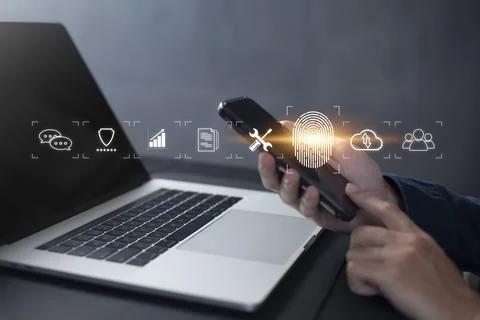 Person touching virtual screen to scan fingerprints, digital transformation m Stock Photos