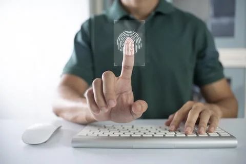 Person touching virtual screen to scan fingerprints, digital transformation m Stock Photos