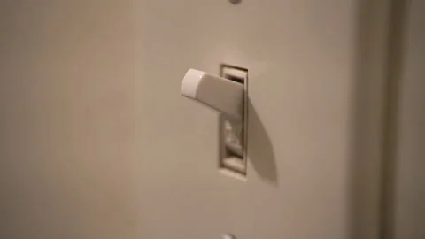 Person turns light switch on and off. Close up of finger. Stock Footage 155352550