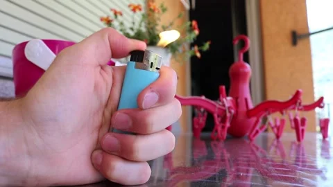 Person turns on lighter Stock-Footage 148073757