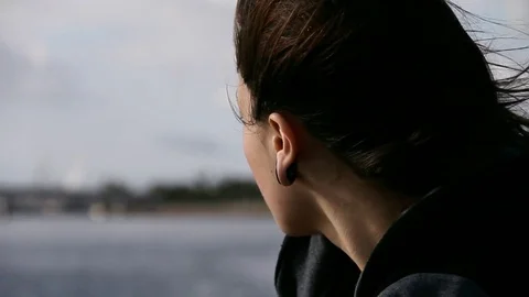 Person turns, looking at the sea Stock Footage 83124374