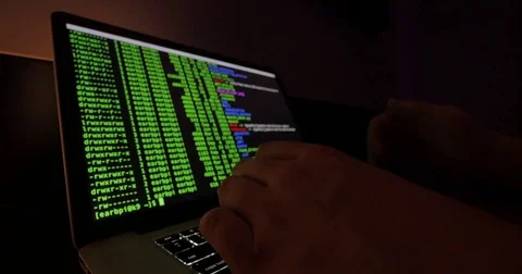 Person types code into a computer Stock Footage 81948327