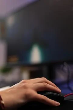 Person typing on black computer keyboard at night Stock Photos