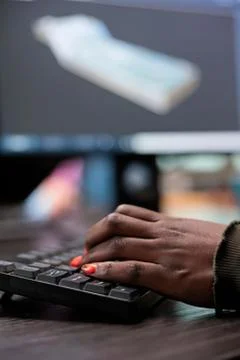 Person typing on black keyboard with computer screen Stock Photos
