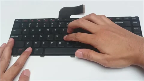 Person typing on black laptop replacement keyboard top view Stock Footage 340860925