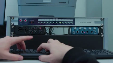A person is typing on a computer keyboard and switching buttons Video stock 300755932