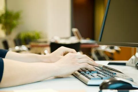 Person typing on computer keyboard, cropped Foto stock