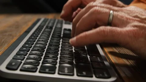 Person typing on computer keyboard 스톡 동영상 269870747