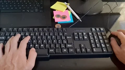Person typing on computer keyboard. Office worker using PC for digital business Stock Footage 340241509