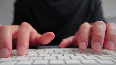 Person typing on computer keyboard working efficiently. Stock Footage 334282555
