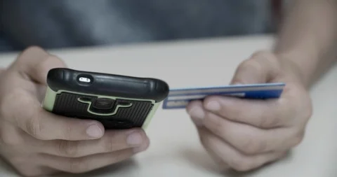 Person typing information in a cellular Stock Footage 92150587