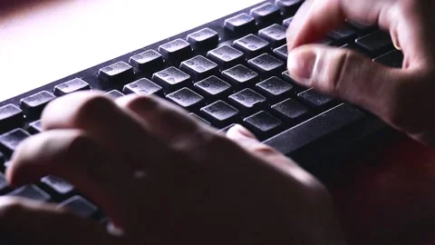 A Person Typing On A Keyboard Video stock 170153580