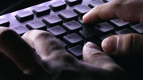 A Person Typing On A Keyboard Video stock 171273776