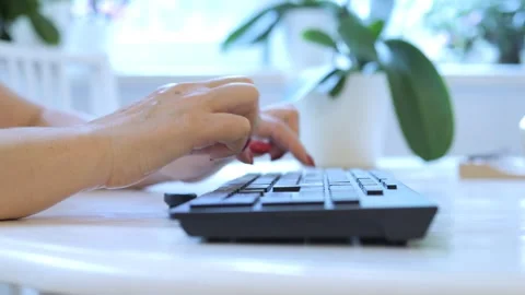 Person is typing on a keyboard Stock Footage 327197275