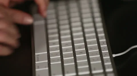 Person typing on keyboard, side view Stock Footage 26312075