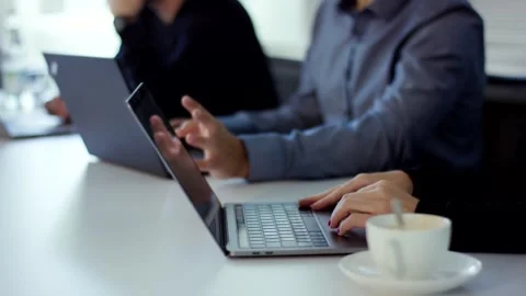 Person Typing on Laptop at Bright Office Desk, Coffee Cup, Close Up Shot Stock-Footage 341441553