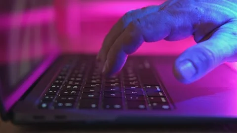 Person typing at laptop computer at night. Internet security, cyber attack Stock Footage 237520202