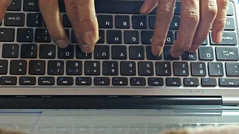 Person typing on laptop Stock Footage 306301807