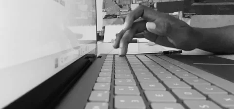 A person typing on the laptop using the keypad Stock Footage 253787916