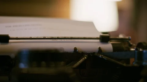 Person typing letter on typewriter Stock Footage 100049986