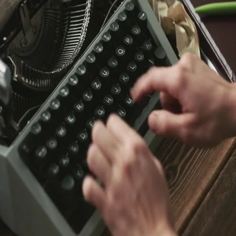 Person typing on manual typewriter Stock Footage 69545315