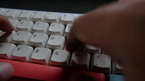 Person typing on a mechanical keyboard Stock Footage 263794000