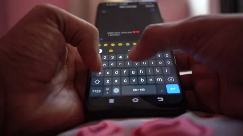 Person typing message or e-mail on smartphone Stock Footage 250322325