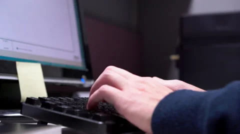 Person typing at office desk computer keyboard 4k Stock-Footage 58007364
