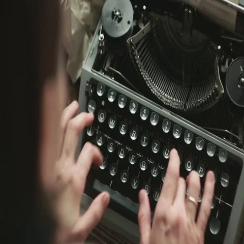 Person typing on old typewriter Stock Footage 69545253
