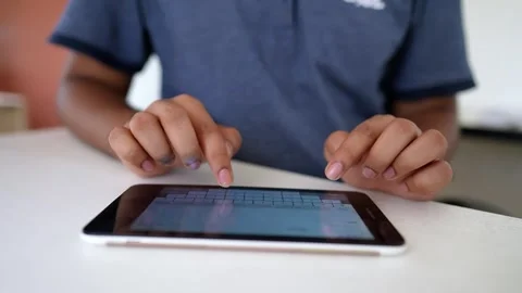 Person Typing on Tablet with Touchscreen Keyboard Stock Footage 318578270