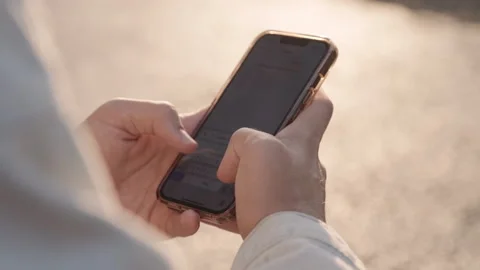 Person is typing a text message on a mobile phone - close-up. Close-up of m.. Stock Footage 254657066