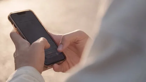 Person is typing a text message on a mobile phone - close-up. Close-up of m.. Stock Footage 302865930