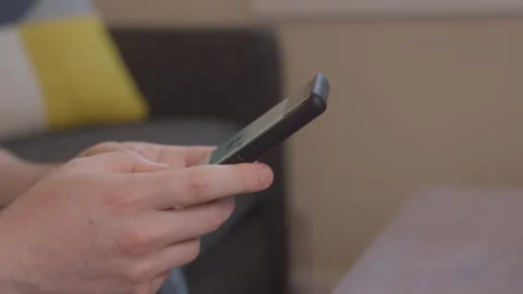 Person typing a text on a smartphone 4K Stock Footage 243396611