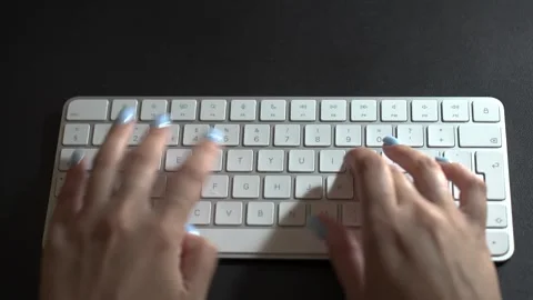 Person typing on white computer keyboard, top view Stock Footage 246727751