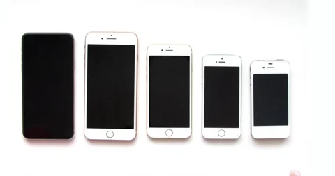 A Person unlocking old several iPhones. Front view of vintage iPhones. Stock Footage 137922431