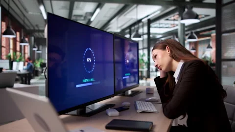 Person Updating Computer System Software Stock Footage 334533860