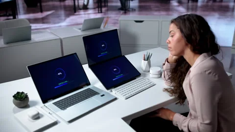 Person Updating Laptop Software While Waiting For Slow System Install Stock Footage 335459477