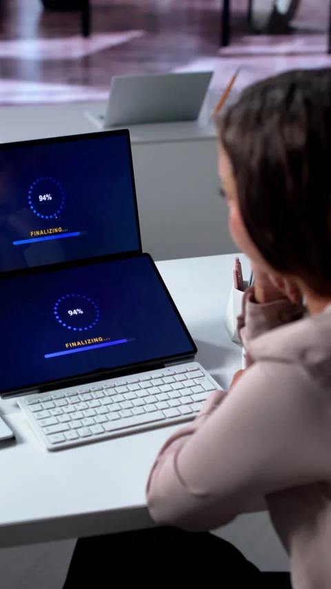 Person Updating Laptop Software While Waiting For Slow System Install Stock Footage 336377998