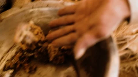 Person uproot glue on the bag, row materials of Incense stick Manufacturing Stock Footage 239448721