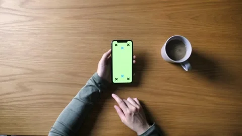 Person use smartphone while relaxing in the room of the house screen on mobile Stock Footage 336585684